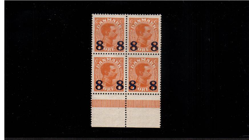 8or on 7or Orange - King Christian X<br/>
A superb unmounted mint surcharged lower marginal block of four.
