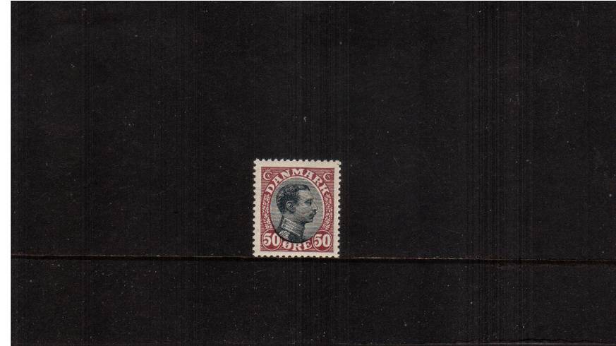 50or Black and Claret - King Christian X<br/>
A superb unmounted mint single.