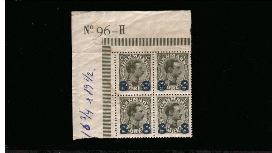 8or on 12or Olive Slate - TYPE B - King Christian X<br/>
An unmounted mint NW corner block of four<br/>
Some minor creasing in the margin but stamps are fine