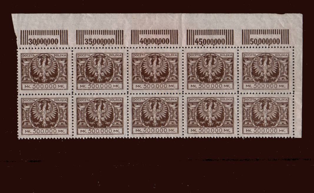 The 500,000m. Brown in a superb unmounted mint NE corner block of ten<br/>showing the sheet margins with numerals.<br/>SG Cat as mounted singles £70