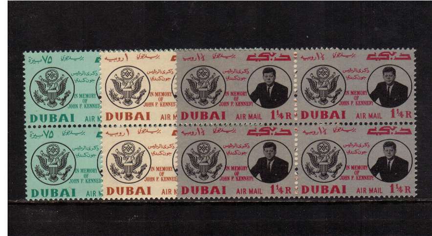 President Kennedy Memorial Issue set of three in superb unmounted mint blocks of four.